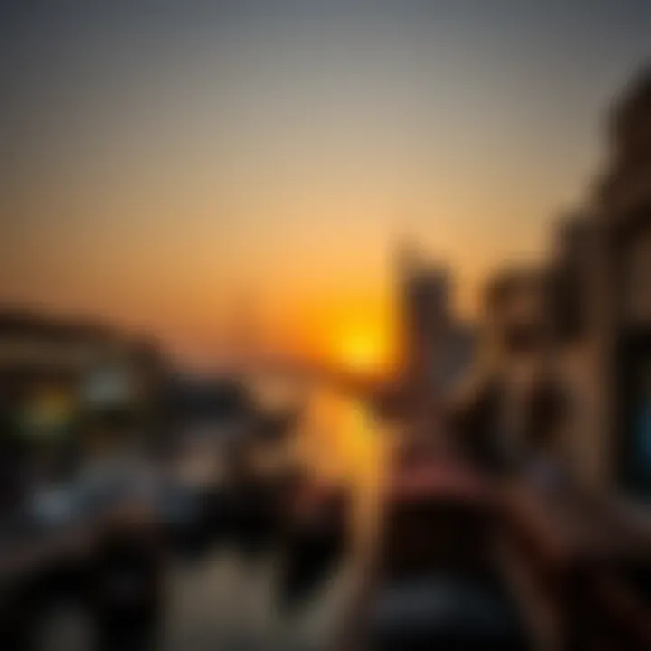 A picturesque sunset over the Dubai Creek highlighting Al Seef Market's location