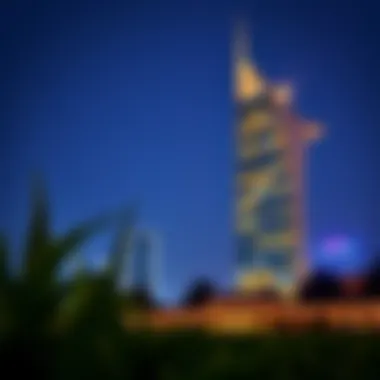 Al Gurg Tower at Night Evening shot of Al Gurg Tower illuminated, capturing its vibrant presence in Dubai at night.