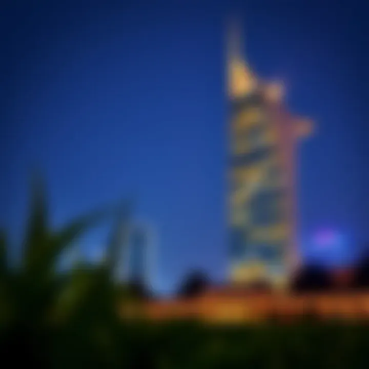 Al Gurg Tower at Night Evening shot of Al Gurg Tower illuminated, capturing its vibrant presence in Dubai at night.