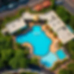 Aerial view showcasing the Al Mamzar Swimming Pool's expansive layout and surrounding greenery