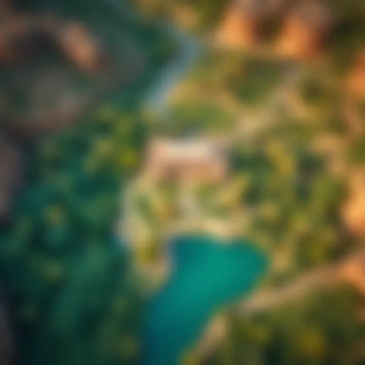 Aerial Perspective of Wadi Hatta's Greenery Aerial view showcasing the lush greenery surrounding Wadi Hatta