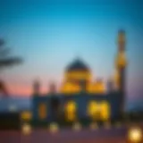 A tranquil view of a traditional UAE mosque illuminated at sunset during Ramadan.