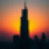 Silhouette of Iconic Skyscraper at Sunset Iconic skyscraper silhouette against a sunset sky